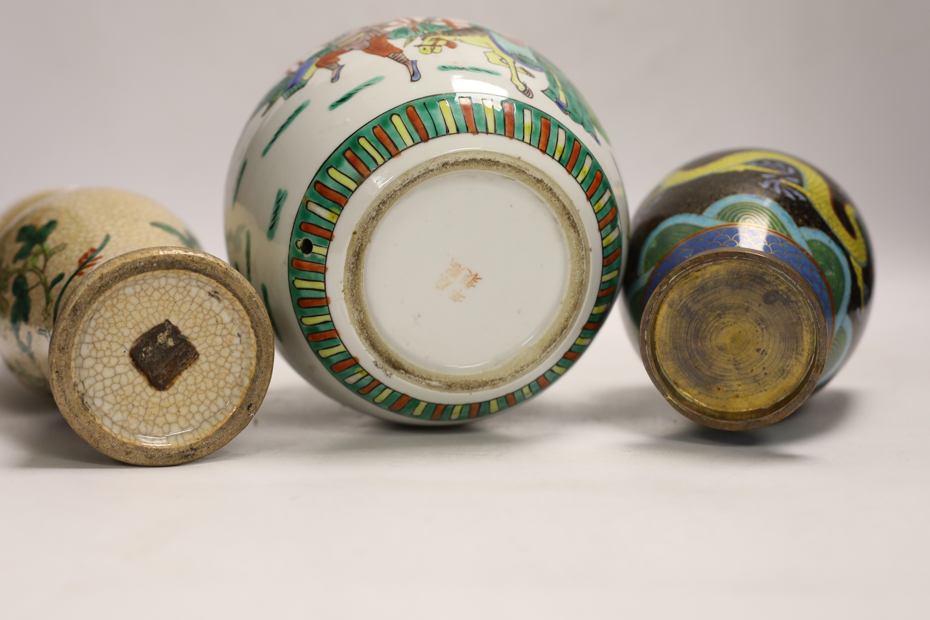 A Chinese famille verte crackle glaze vase, a jar, a cloisonné enamel dragon vase, another enamelled jar and cover and a soapstone vase, largest 25cm high